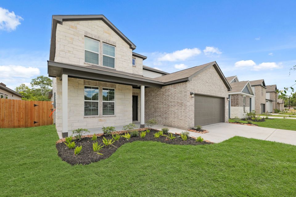 A house with a large front yard.