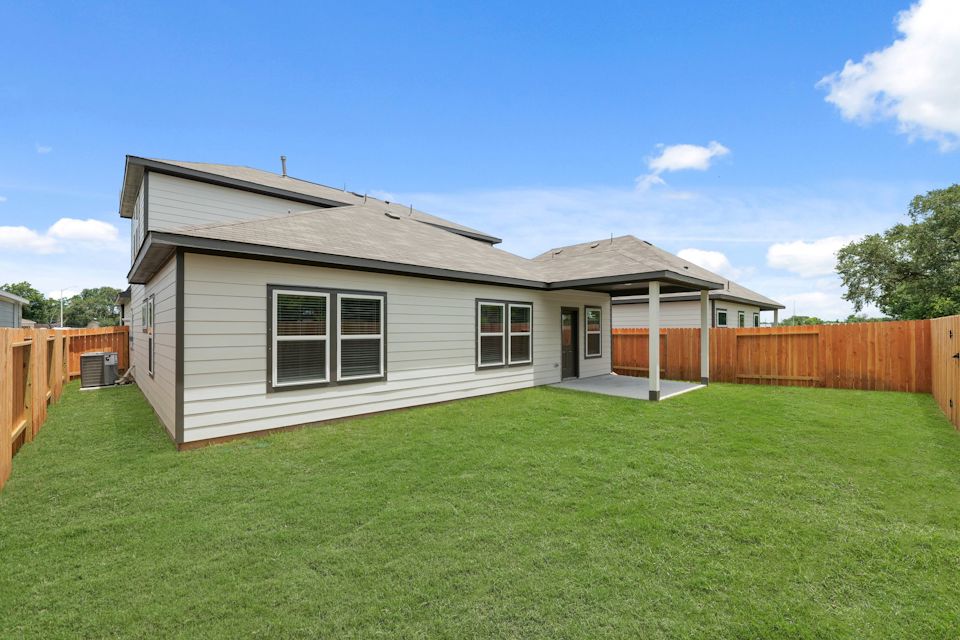 A house with a fence around it.