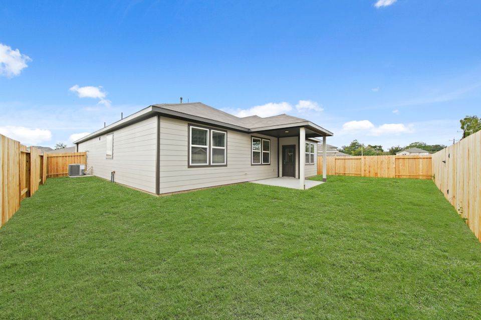 A house with a fence around it.