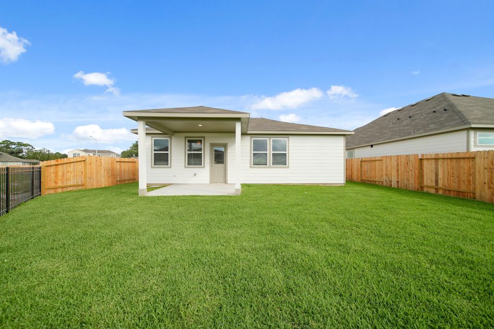 A house with a fence around it.