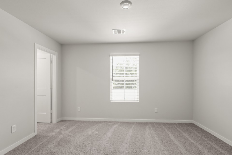 A hallway with a sign on the wall.