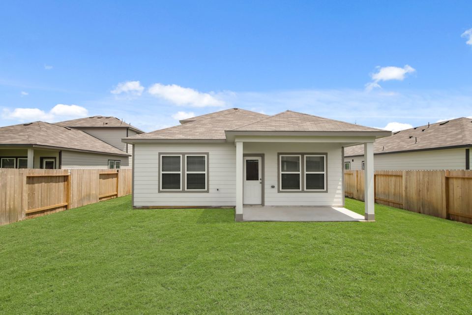 A house with a fence around it.