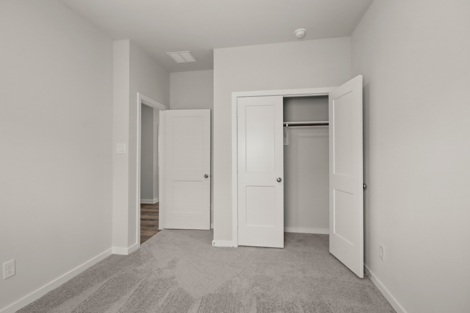 A room with white doors.