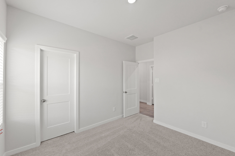 A room with white doors.