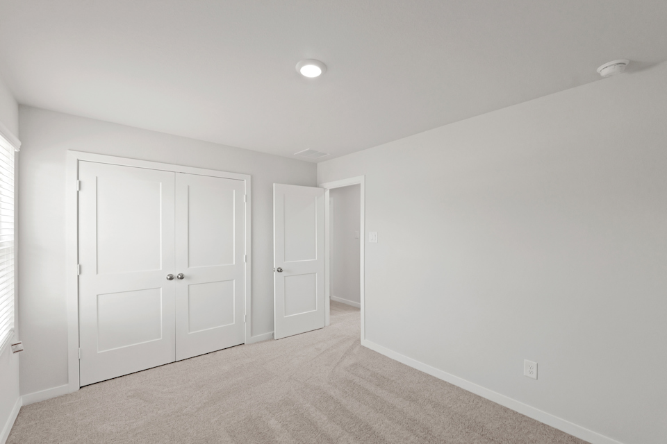 A room with white doors.
