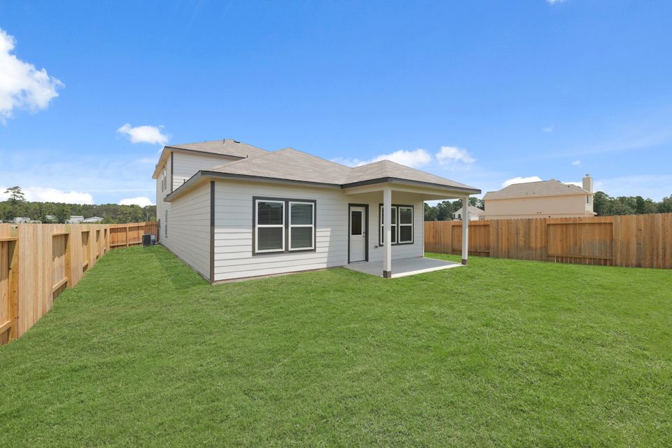 A house with a fence around it.