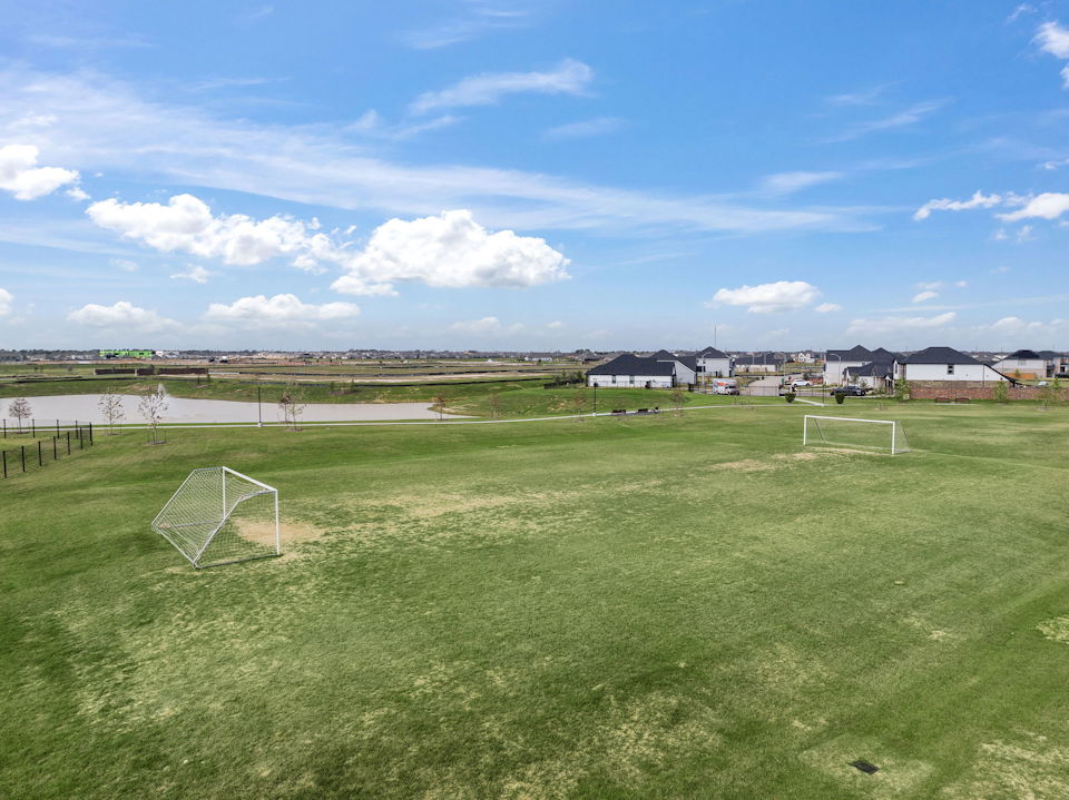 A football field with a goal.