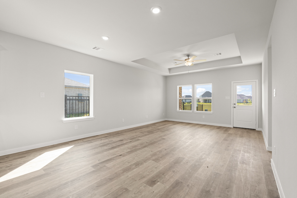 A room with a wood floor and a wood floor.