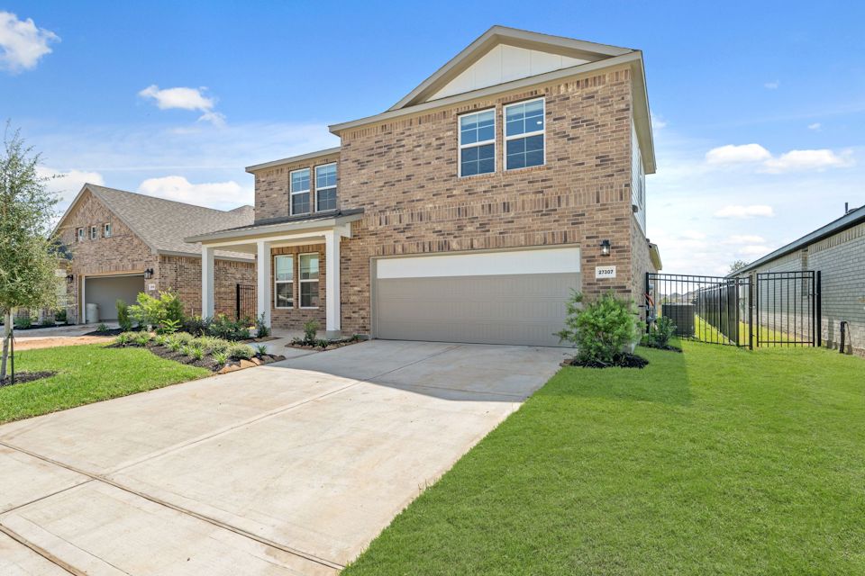 A house with a driveway.