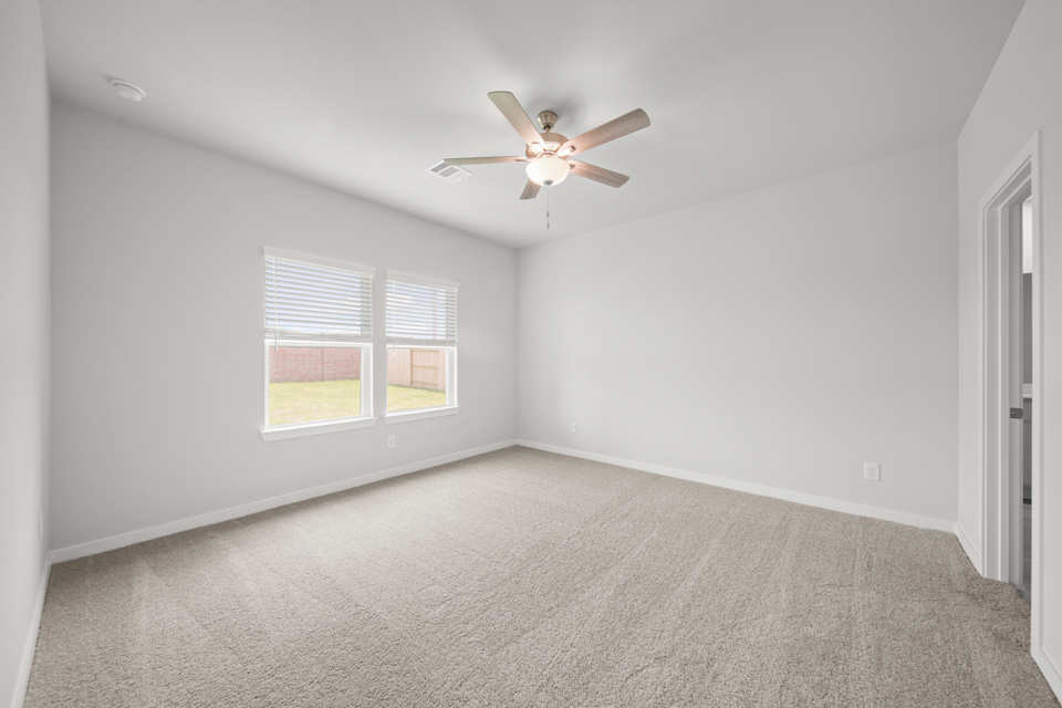 A ceiling fan in a room.
