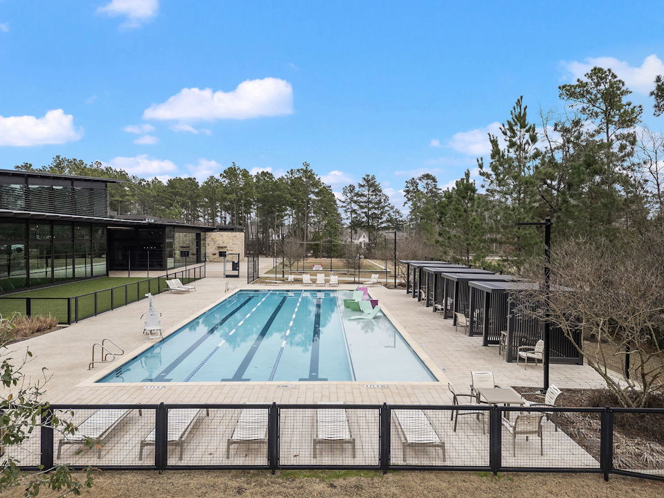 A swimming pool with a fence around it.
