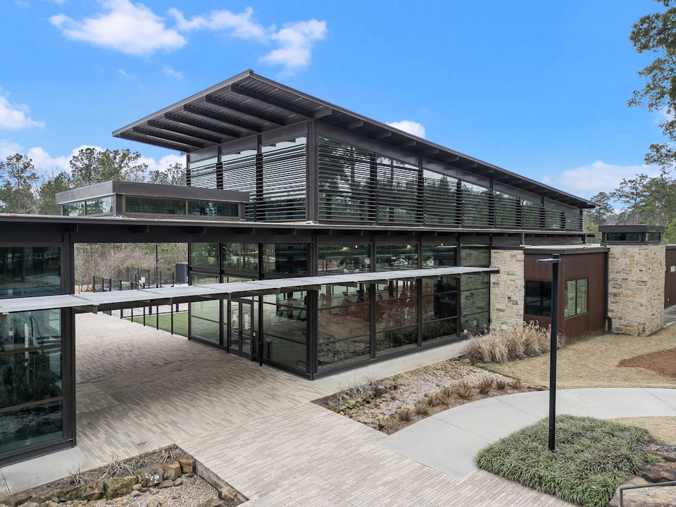 A building with a glass front.
