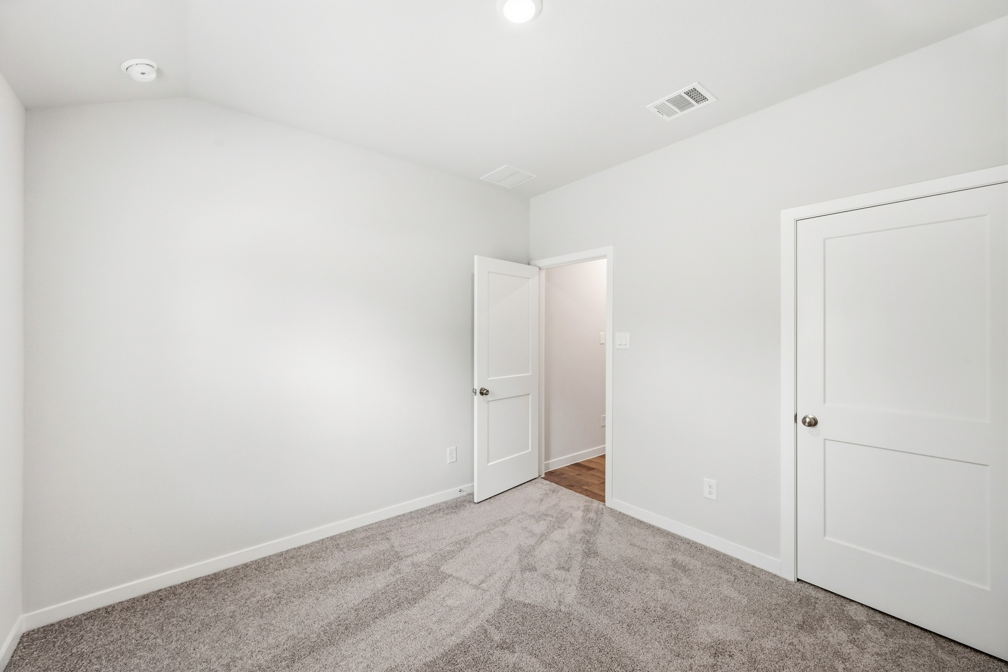 A room with white doors.