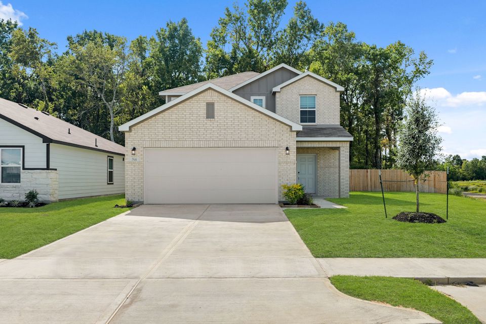 A house with a driveway.