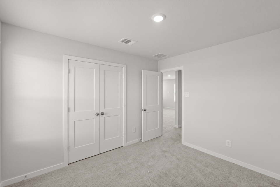 A room with white doors.