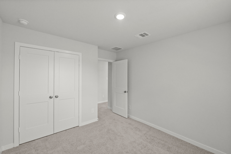 A room with white doors.
