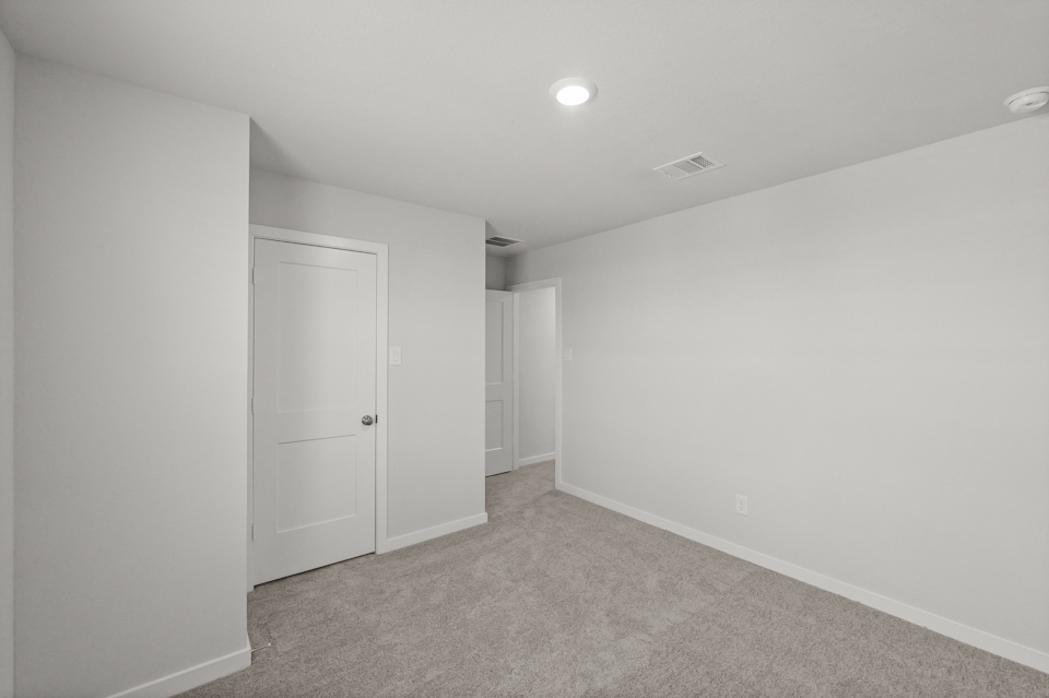 A room with white doors.