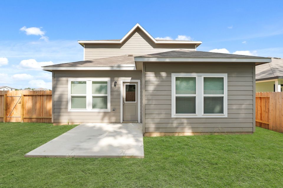 A house with a fence around it.