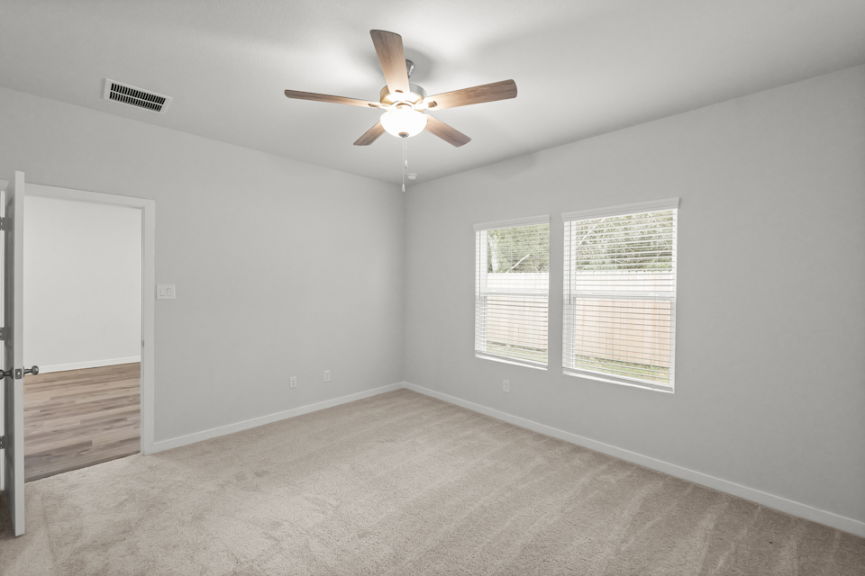 A ceiling fan in a room.