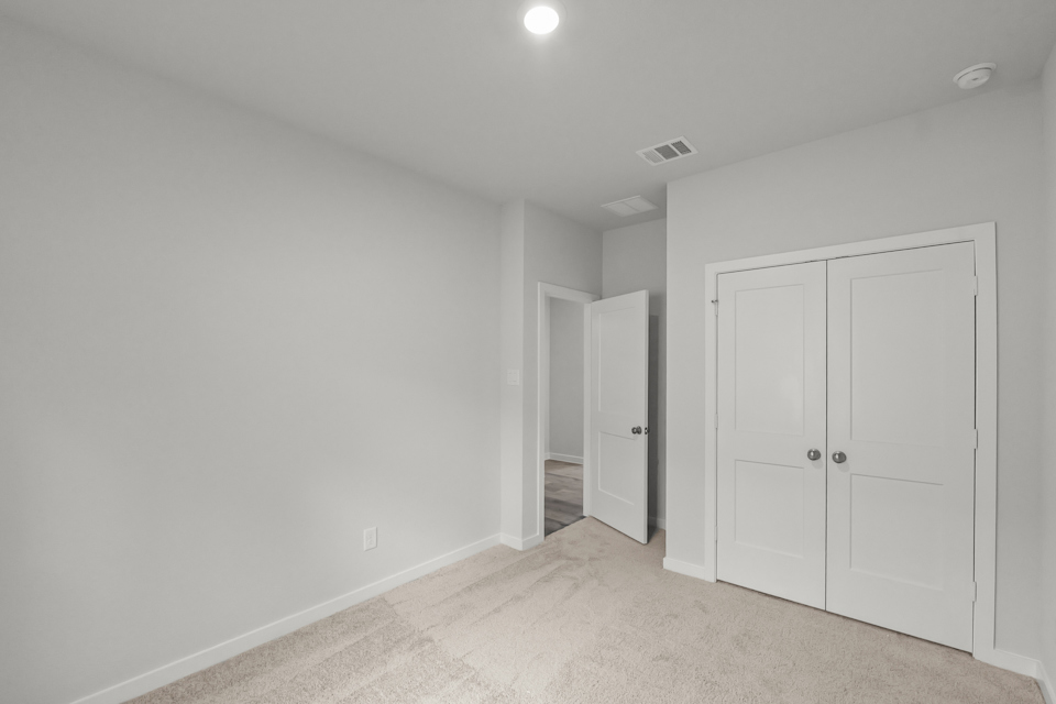 A room with white doors.