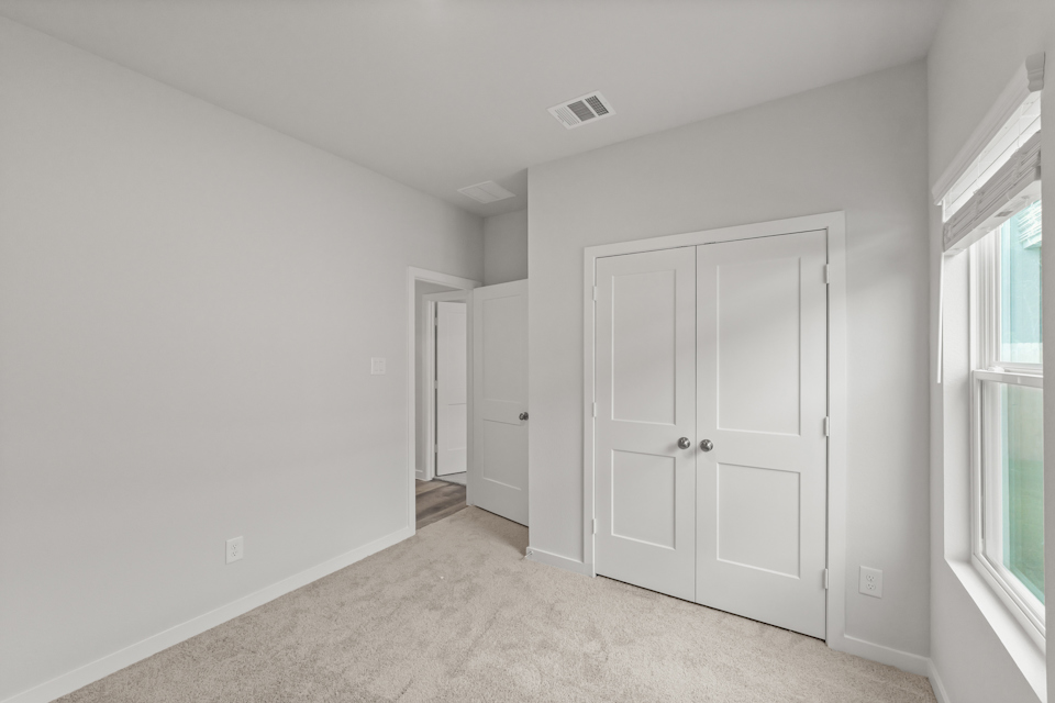 A room with white doors.