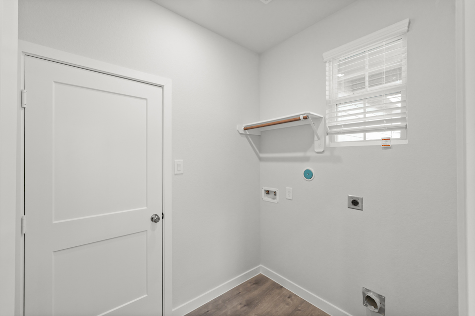 A white door with a window.