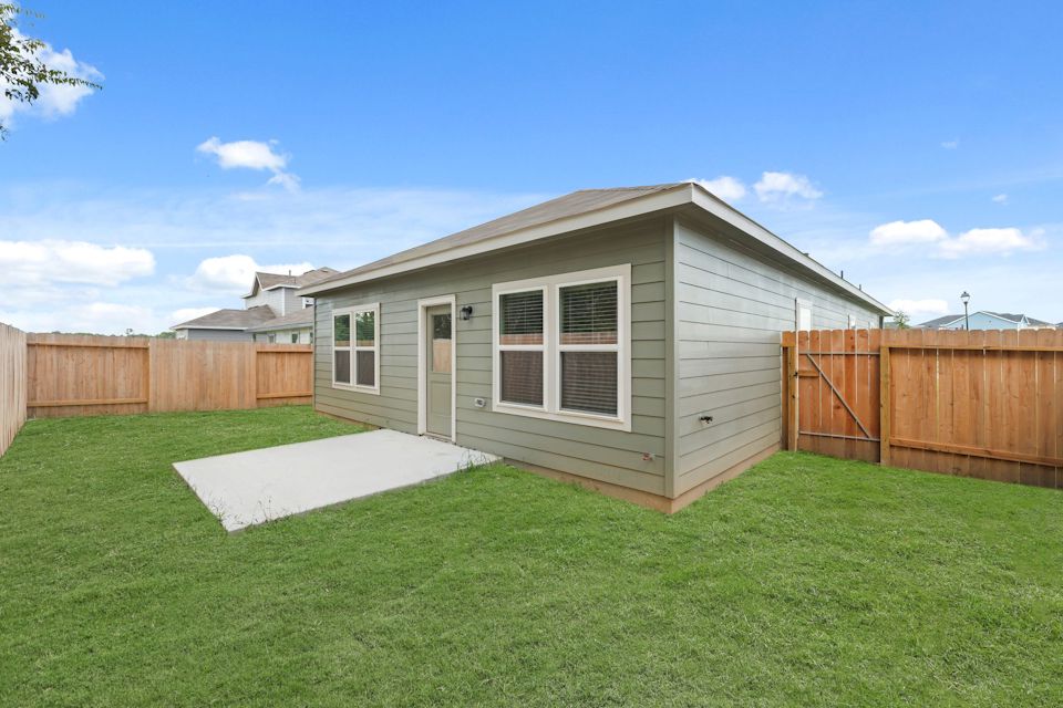 A house with a fence around it.