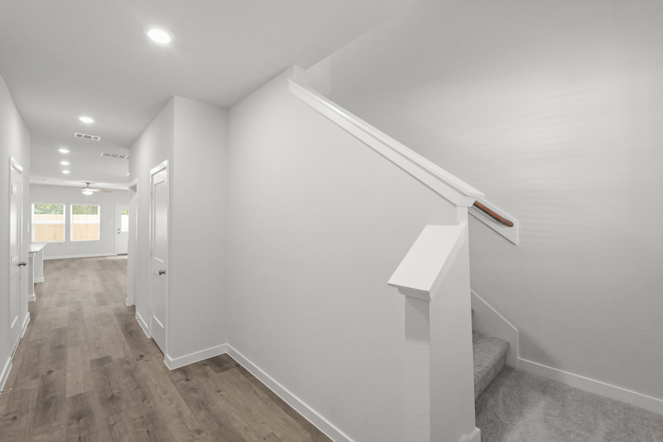 A white staircase in a house.