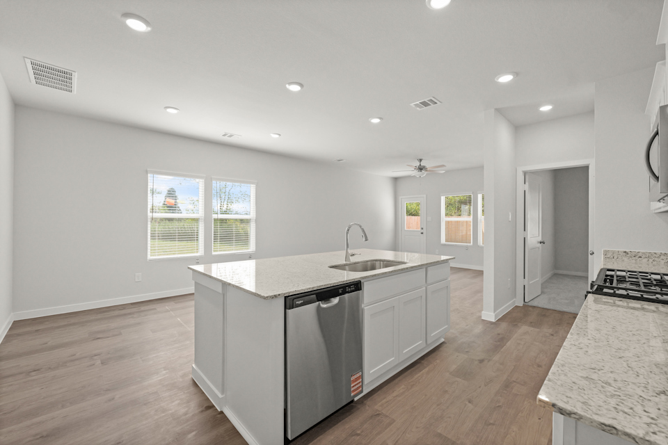 A kitchen with a large island.