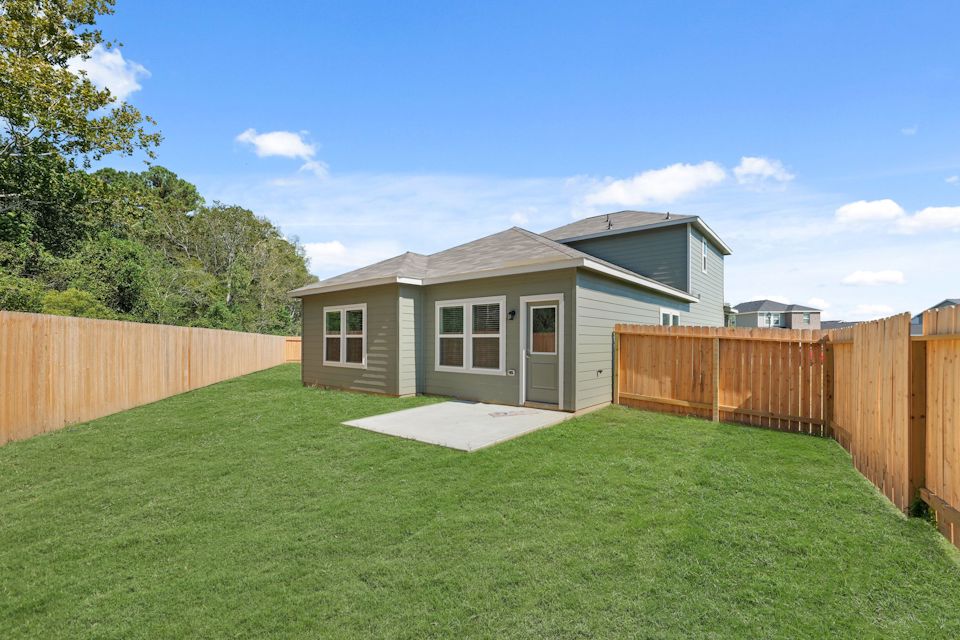A house with a fence around it.
