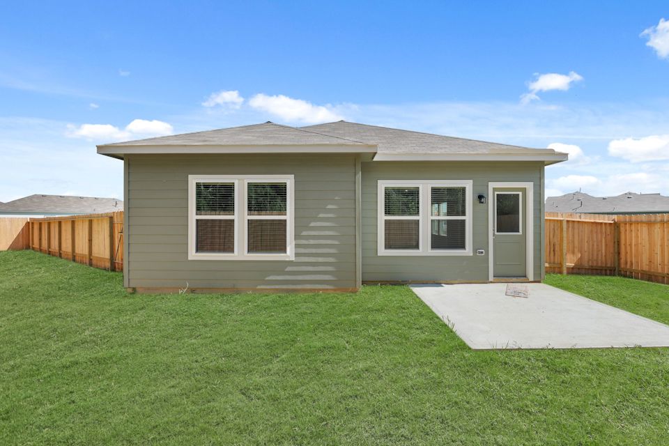A house with a fence around it.