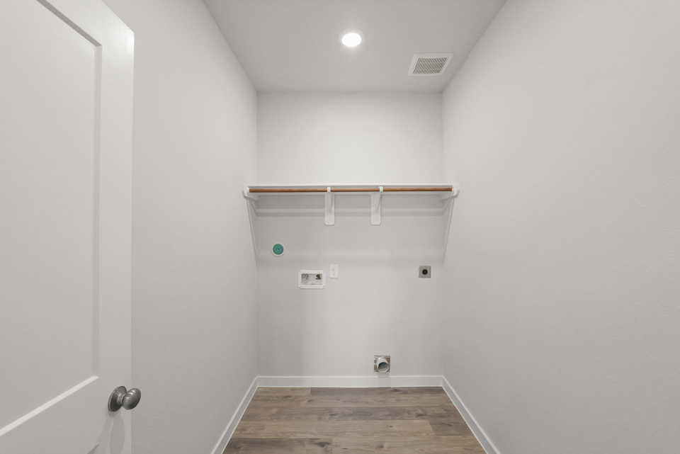 A room with a wood floor and a wood floor.