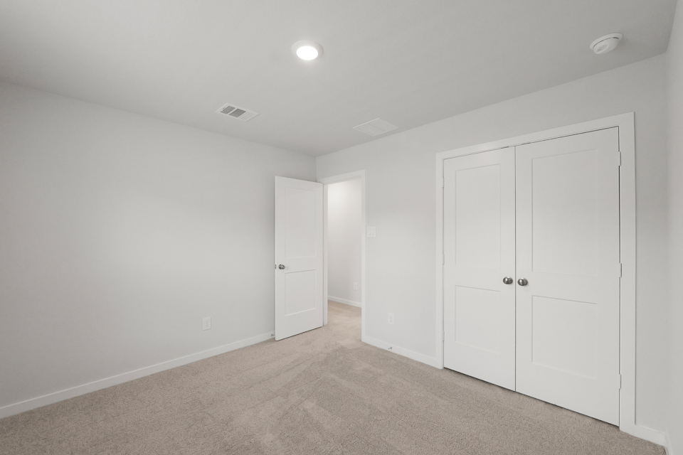 A room with white doors.