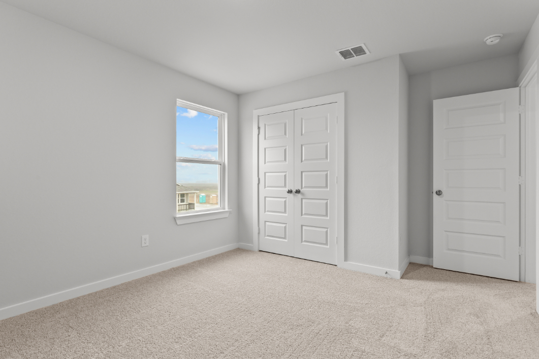 A room with white doors.