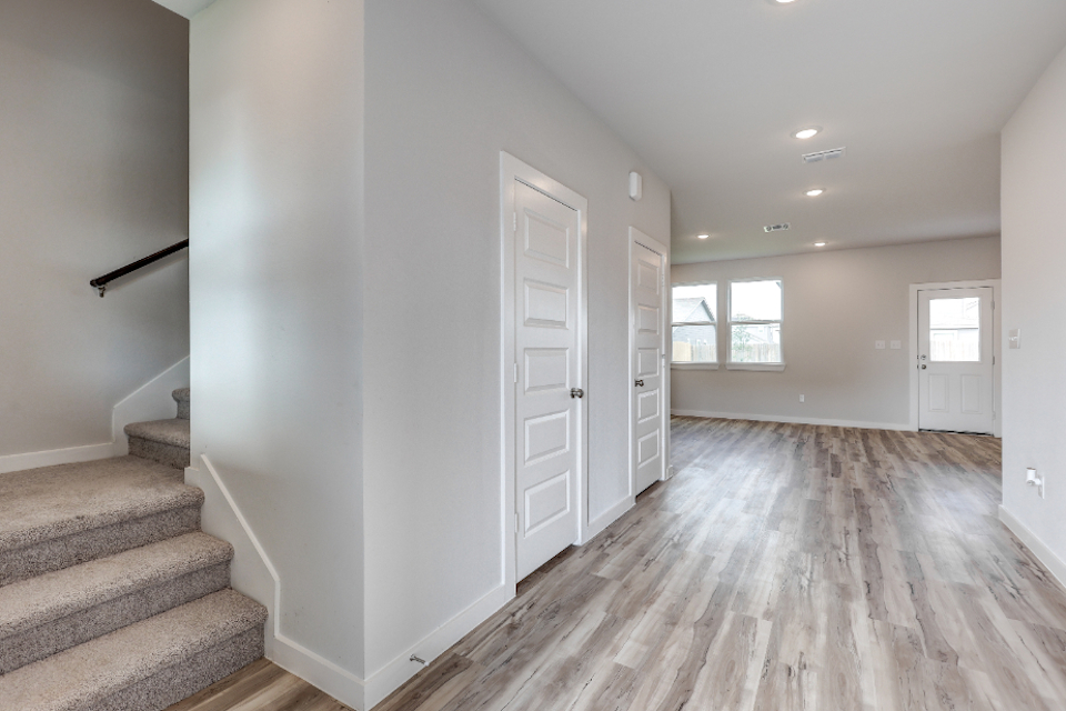 A room with white doors.