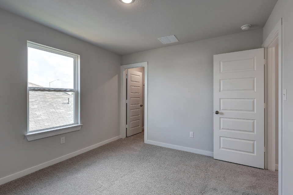 A room with white doors.