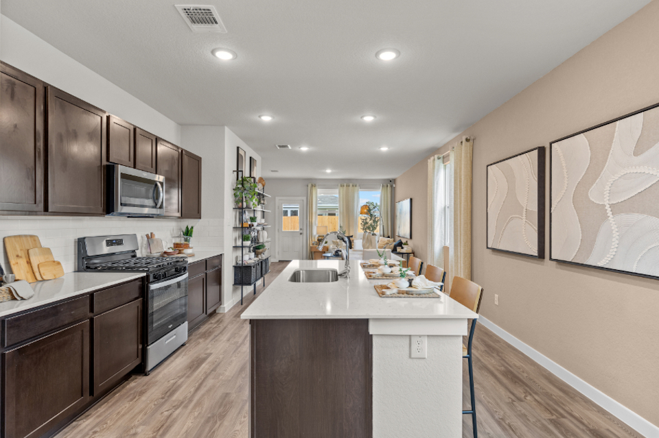A kitchen with a large island.