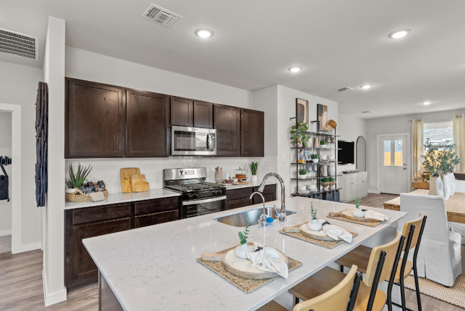 A kitchen with a large island.
