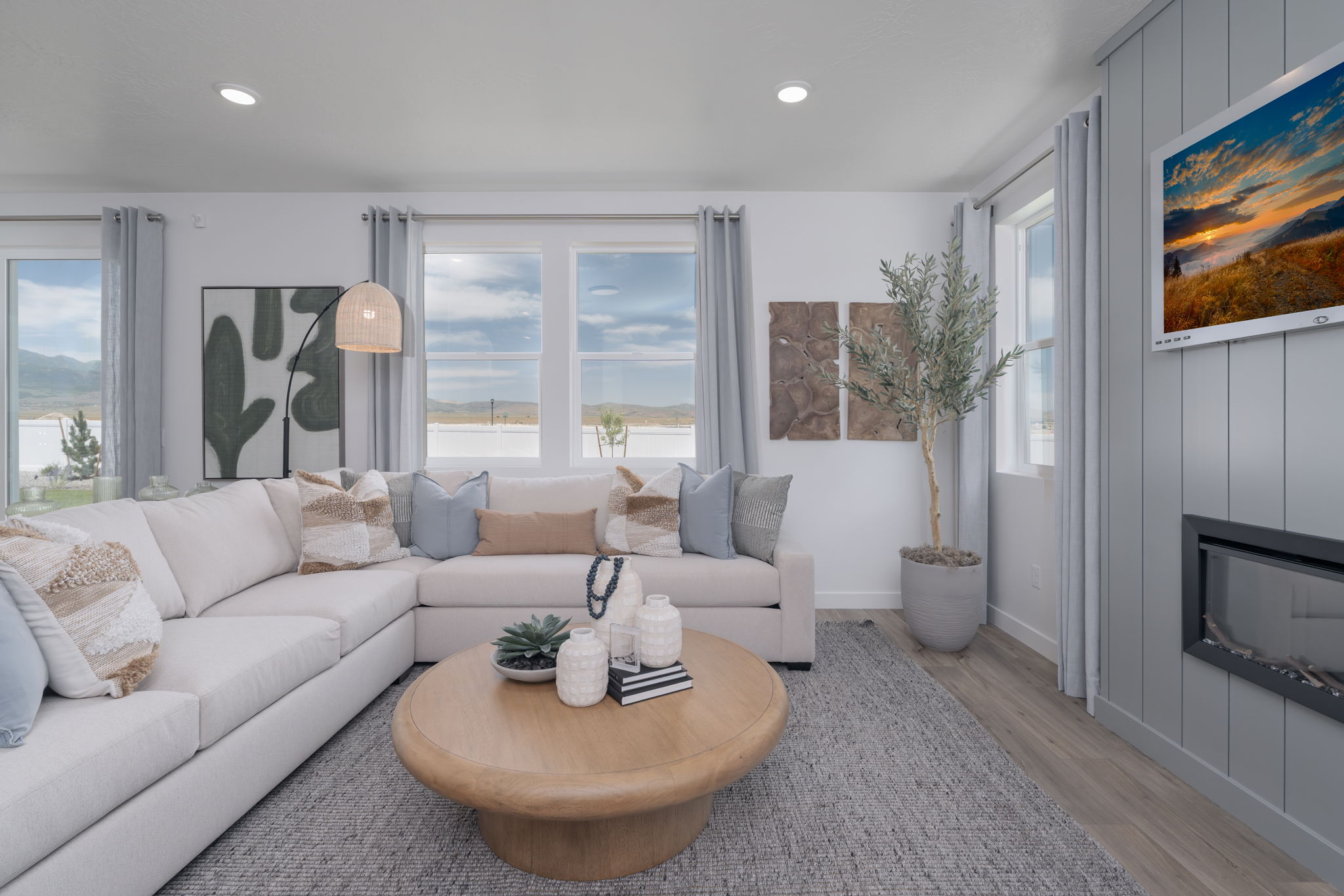 A living room with a large window.