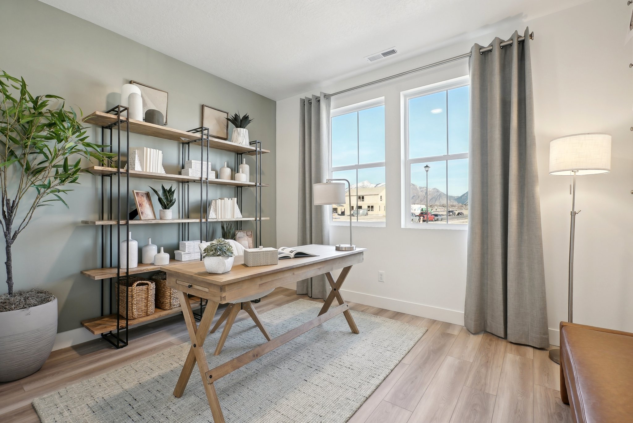 A room with a table and shelves.