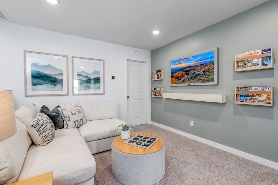 A living room with a couch and a coffee table.