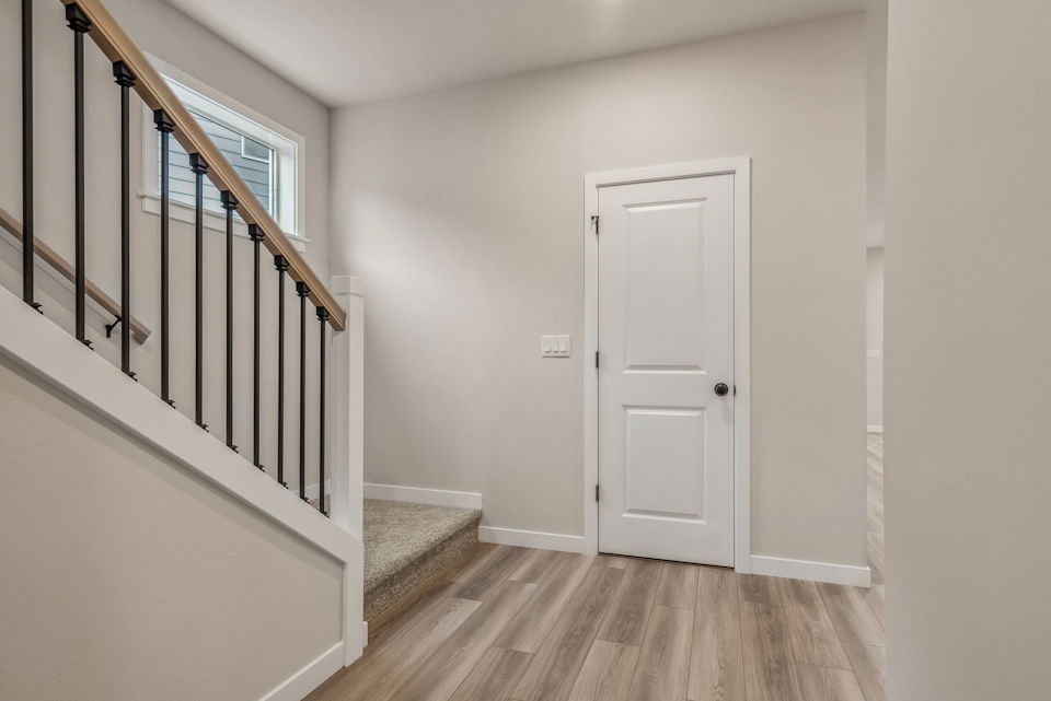 A white door in a room.