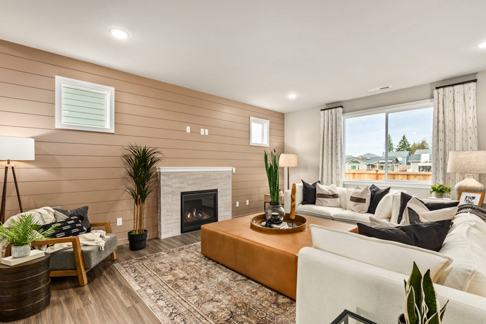 A living room with a fireplace.