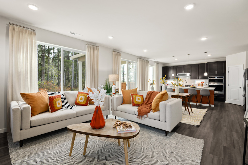 A living room with a large window.
