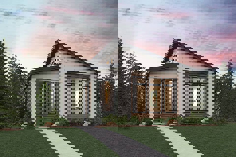 A house with a lawn and trees.