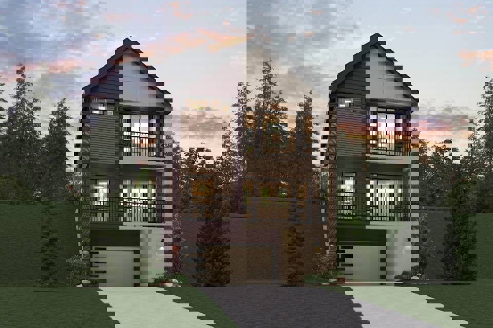 A house with a driveway and trees.