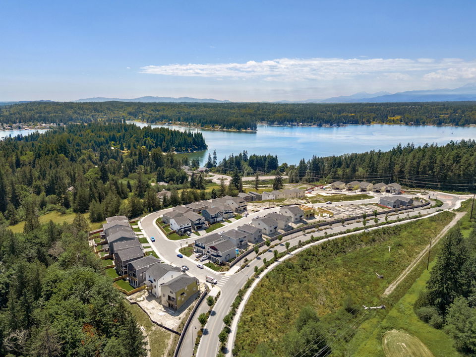 A large building next to a body of water.