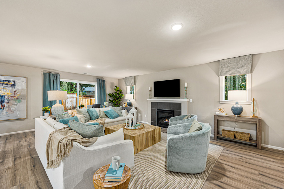 A living room with a fireplace.