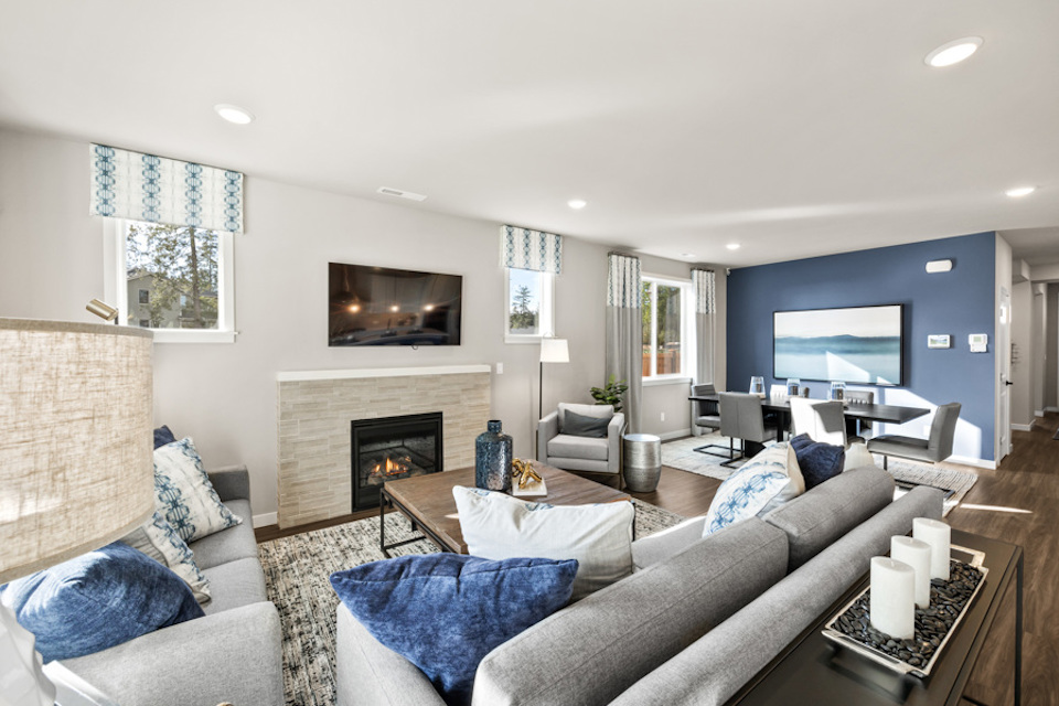 A living room with a fireplace.