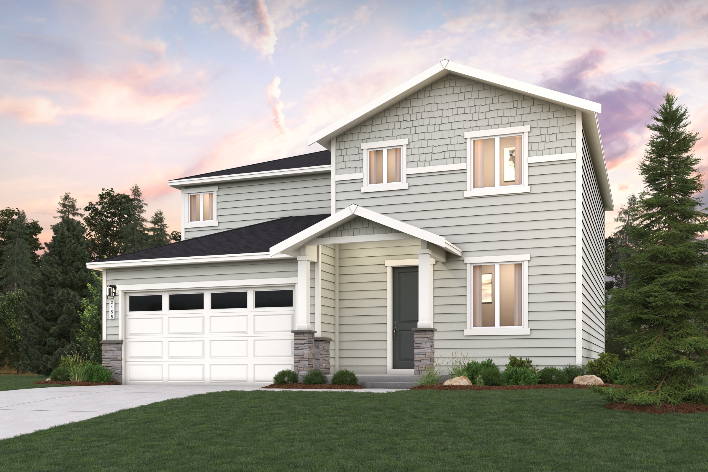 A house with a lawn in front of it.